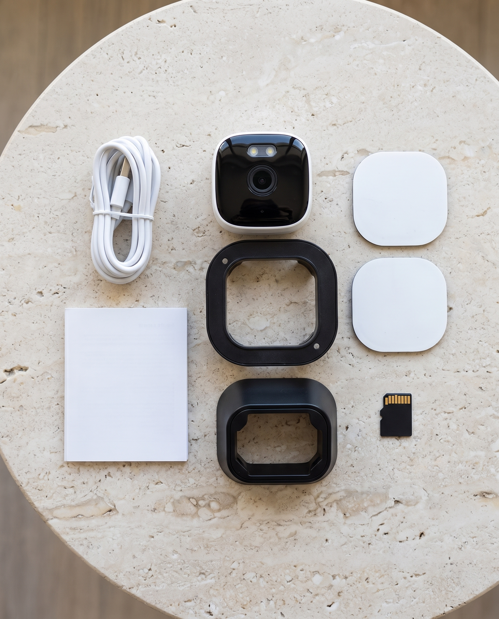 Sill Cam camera kit flat lay – exact kit contents to be confirmed, AI placeholder